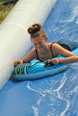 Ilminster Town FC fun day Part 28 – July 9, 2016: A giant water slide was the star attraction at a family fun day held to celebrate Ilminster Town Football Club’s new Archie Gooch Pavilion headquarters in Britten’s Field. Photo 2