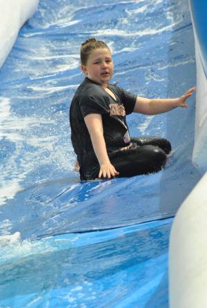 Ilminster Town FC fun day Part 28 – July 9, 2016: A giant water slide was the star attraction at a family fun day held to celebrate Ilminster Town Football Club’s new Archie Gooch Pavilion headquarters in Britten’s Field. Photo 4
