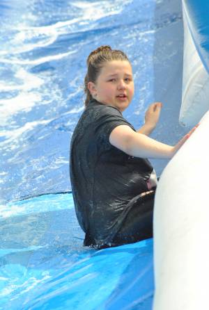 Ilminster Town FC fun day Part 28 – July 9, 2016: A giant water slide was the star attraction at a family fun day held to celebrate Ilminster Town Football Club’s new Archie Gooch Pavilion headquarters in Britten’s Field. Photo 5