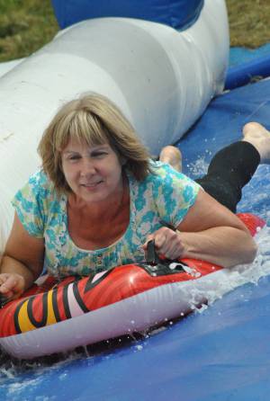 Ilminster Town FC fun day Part 29 – July 9, 2016: A giant water slide was the star attraction at a family fun day held to celebrate Ilminster Town Football Club’s new Archie Gooch Pavilion headquarters in Britten’s Field. Photo 10