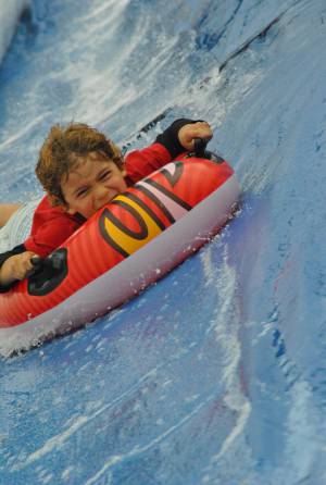 Ilminster Town FC fun day Part 29 – July 9, 2016: A giant water slide was the star attraction at a family fun day held to celebrate Ilminster Town Football Club’s new Archie Gooch Pavilion headquarters in Britten’s Field. Photo 17