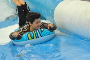 Ilminster Town FC fun day Part 29 – July 9, 2016: A giant water slide was the star attraction at a family fun day held to celebrate Ilminster Town Football Club’s new Archie Gooch Pavilion headquarters in Britten’s Field. Photo 22