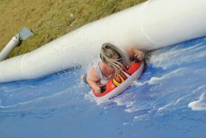 Ilminster Town FC fun day Part 29 – July 9, 2016: A giant water slide was the star attraction at a family fun day held to celebrate Ilminster Town Football Club’s new Archie Gooch Pavilion headquarters in Britten’s Field. Photo 6