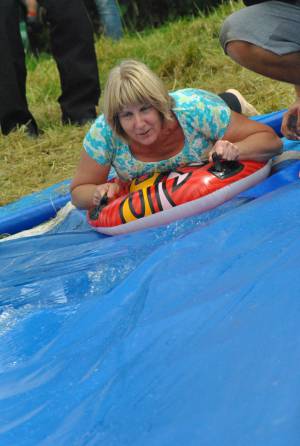 Ilminster Town FC fun day Part 29 – July 9, 2016: A giant water slide was the star attraction at a family fun day held to celebrate Ilminster Town Football Club’s new Archie Gooch Pavilion headquarters in Britten’s Field. Photo 7