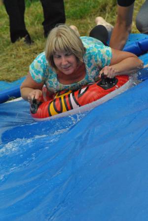 Ilminster Town FC fun day Part 29 – July 9, 2016: A giant water slide was the star attraction at a family fun day held to celebrate Ilminster Town Football Club’s new Archie Gooch Pavilion headquarters in Britten’s Field. Photo 8