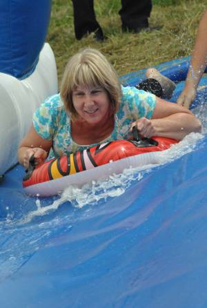 Ilminster Town FC fun day Part 29 – July 9, 2016: A giant water slide was the star attraction at a family fun day held to celebrate Ilminster Town Football Club’s new Archie Gooch Pavilion headquarters in Britten’s Field. Photo 9