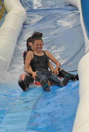 Ilminster Town FC fun day Part 30 – July 9, 2016: A giant water slide was the star attraction at a family fun day held to celebrate Ilminster Town Football Club’s new Archie Gooch Pavilion headquarters in Britten’s Field. Photo 19