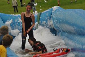 Ilminster Town FC fun day Part 30 – July 9, 2016: A giant water slide was the star attraction at a family fun day held to celebrate Ilminster Town Football Club’s new Archie Gooch Pavilion headquarters in Britten’s Field. Photo 23