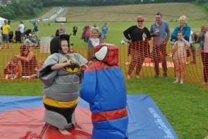 Ilminster Town FC fun day Part 30 – July 9, 2016: A giant water slide was the star attraction at a family fun day held to celebrate Ilminster Town Football Club’s new Archie Gooch Pavilion headquarters in Britten’s Field. Photo 6