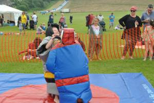 Ilminster Town FC fun day Part 30 – July 9, 2016: A giant water slide was the star attraction at a family fun day held to celebrate Ilminster Town Football Club’s new Archie Gooch Pavilion headquarters in Britten’s Field. Photo 7