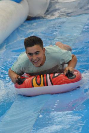 Ilminster Town FC fun day Part 31 – July 9, 2016: A giant water slide was the star attraction at a family fun day held to celebrate Ilminster Town Football Club’s new Archie Gooch Pavilion headquarters in Britten’s Field. Photo 10