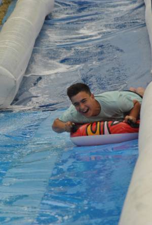 Ilminster Town FC fun day Part 31 – July 9, 2016: A giant water slide was the star attraction at a family fun day held to celebrate Ilminster Town Football Club’s new Archie Gooch Pavilion headquarters in Britten’s Field. Photo 9
