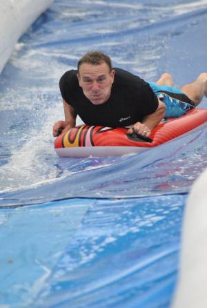 Ilminster Town FC fun day Part 32 – July 9, 2016: A giant water slide was the star attraction at a family fun day held to celebrate Ilminster Town Football Club’s new Archie Gooch Pavilion headquarters in Britten’s Field. Photo 10