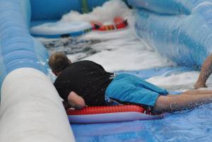 Ilminster Town FC fun day Part 32 – July 9, 2016: A giant water slide was the star attraction at a family fun day held to celebrate Ilminster Town Football Club’s new Archie Gooch Pavilion headquarters in Britten’s Field. Photo 11