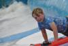 Ilminster Town FC fun day Part 32 – July 9, 2016: A giant water slide was the star attraction at a family fun day held to celebrate Ilminster Town Football Club’s new Archie Gooch Pavilion headquarters in Britten’s Field. Photo 16