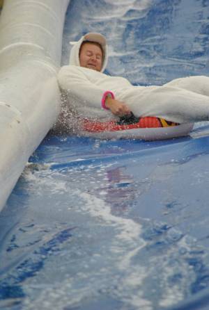 Ilminster Town FC fun day Part 32 – July 9, 2016: A giant water slide was the star attraction at a family fun day held to celebrate Ilminster Town Football Club’s new Archie Gooch Pavilion headquarters in Britten’s Field. Photo 17