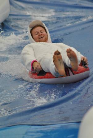 Ilminster Town FC fun day Part 32 – July 9, 2016: A giant water slide was the star attraction at a family fun day held to celebrate Ilminster Town Football Club’s new Archie Gooch Pavilion headquarters in Britten’s Field. Photo 18