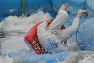 Ilminster Town FC fun day Part 32 – July 9, 2016: A giant water slide was the star attraction at a family fun day held to celebrate Ilminster Town Football Club’s new Archie Gooch Pavilion headquarters in Britten’s Field. Photo 21