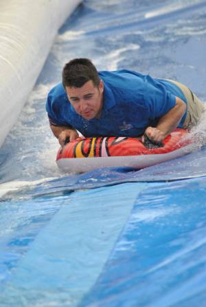 Ilminster Town FC fun day Part 32 – July 9, 2016: A giant water slide was the star attraction at a family fun day held to celebrate Ilminster Town Football Club’s new Archie Gooch Pavilion headquarters in Britten’s Field. Photo 26