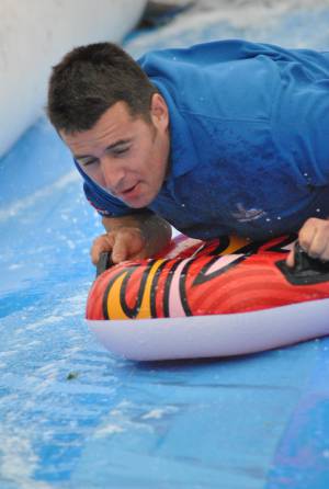 Ilminster Town FC fun day Part 32 – July 9, 2016: A giant water slide was the star attraction at a family fun day held to celebrate Ilminster Town Football Club’s new Archie Gooch Pavilion headquarters in Britten’s Field. Photo 27