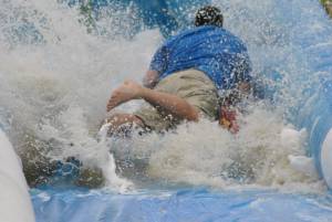 Ilminster Town FC fun day Part 32 – July 9, 2016: A giant water slide was the star attraction at a family fun day held to celebrate Ilminster Town Football Club’s new Archie Gooch Pavilion headquarters in Britten’s Field. Photo 28