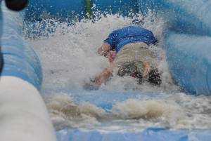 Ilminster Town FC fun day Part 32 – July 9, 2016: A giant water slide was the star attraction at a family fun day held to celebrate Ilminster Town Football Club’s new Archie Gooch Pavilion headquarters in Britten’s Field. Photo 29