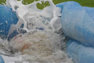 Ilminster Town FC fun day Part 32 – July 9, 2016: A giant water slide was the star attraction at a family fun day held to celebrate Ilminster Town Football Club’s new Archie Gooch Pavilion headquarters in Britten’s Field. Photo 30