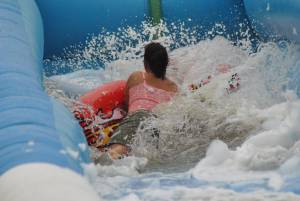 Ilminster Town FC fun day Part 32 – July 9, 2016: A giant water slide was the star attraction at a family fun day held to celebrate Ilminster Town Football Club’s new Archie Gooch Pavilion headquarters in Britten’s Field. Photo 9