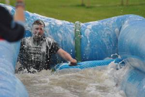 Ilminster Town FC fun day Part 33 – July 9, 2016: A giant water slide was the star attraction at a family fun day held to celebrate Ilminster Town Football Club’s new Archie Gooch Pavilion headquarters in Britten’s Field. Photo 12