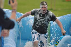 Ilminster Town FC fun day Part 33 – July 9, 2016: A giant water slide was the star attraction at a family fun day held to celebrate Ilminster Town Football Club’s new Archie Gooch Pavilion headquarters in Britten’s Field. Photo 14