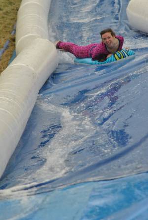 Ilminster Town FC fun day Part 33 – July 9, 2016: A giant water slide was the star attraction at a family fun day held to celebrate Ilminster Town Football Club’s new Archie Gooch Pavilion headquarters in Britten’s Field. Photo 15