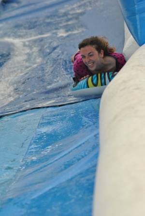 Ilminster Town FC fun day Part 33 – July 9, 2016: A giant water slide was the star attraction at a family fun day held to celebrate Ilminster Town Football Club’s new Archie Gooch Pavilion headquarters in Britten’s Field. Photo 16