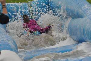 Ilminster Town FC fun day Part 33 – July 9, 2016: A giant water slide was the star attraction at a family fun day held to celebrate Ilminster Town Football Club’s new Archie Gooch Pavilion headquarters in Britten’s Field. Photo 20