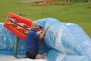 Ilminster Town FC fun day Part 33 – July 9, 2016: A giant water slide was the star attraction at a family fun day held to celebrate Ilminster Town Football Club’s new Archie Gooch Pavilion headquarters in Britten’s Field. Photo 27