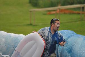 Ilminster Town FC fun day Part 33 – July 9, 2016: A giant water slide was the star attraction at a family fun day held to celebrate Ilminster Town Football Club’s new Archie Gooch Pavilion headquarters in Britten’s Field. Photo 2