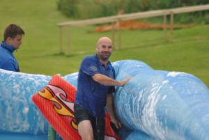 Ilminster Town FC fun day Part 33 – July 9, 2016: A giant water slide was the star attraction at a family fun day held to celebrate Ilminster Town Football Club’s new Archie Gooch Pavilion headquarters in Britten’s Field. Photo 28