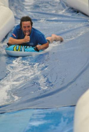 Ilminster Town FC fun day Part 33 – July 9, 2016: A giant water slide was the star attraction at a family fun day held to celebrate Ilminster Town Football Club’s new Archie Gooch Pavilion headquarters in Britten’s Field. Photo 29