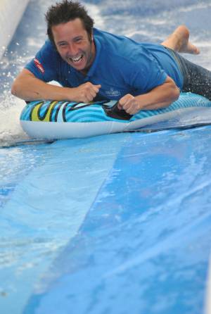 Ilminster Town FC fun day Part 33 – July 9, 2016: A giant water slide was the star attraction at a family fun day held to celebrate Ilminster Town Football Club’s new Archie Gooch Pavilion headquarters in Britten’s Field. Photo 30