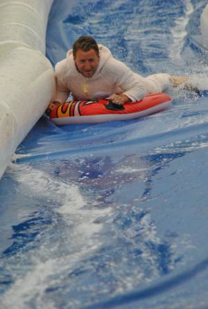 Ilminster Town FC fun day Part 33 – July 9, 2016: A giant water slide was the star attraction at a family fun day held to celebrate Ilminster Town Football Club’s new Archie Gooch Pavilion headquarters in Britten’s Field. Photo 3