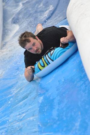 Ilminster Town FC fun day Part 33 – July 9, 2016: A giant water slide was the star attraction at a family fun day held to celebrate Ilminster Town Football Club’s new Archie Gooch Pavilion headquarters in Britten’s Field. Photo 9