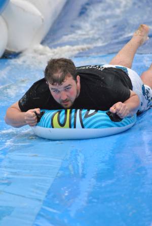 Ilminster Town FC fun day Part 35 – July 9, 2016: A giant water slide was the star attraction at a family fun day held to celebrate Ilminster Town Football Club’s new Archie Gooch Pavilion headquarters in Britten’s Field. Photo 10