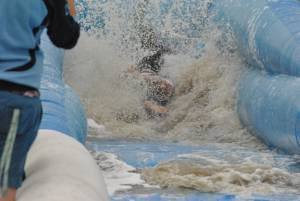 Ilminster Town FC fun day Part 35 – July 9, 2016: A giant water slide was the star attraction at a family fun day held to celebrate Ilminster Town Football Club’s new Archie Gooch Pavilion headquarters in Britten’s Field. Photo 12