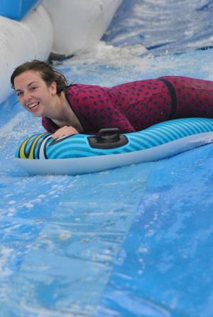 Ilminster Town FC fun day Part 35 – July 9, 2016: A giant water slide was the star attraction at a family fun day held to celebrate Ilminster Town Football Club’s new Archie Gooch Pavilion headquarters in Britten’s Field. Photo 15