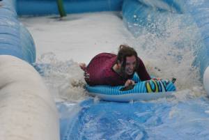 Ilminster Town FC fun day Part 35 – July 9, 2016: A giant water slide was the star attraction at a family fun day held to celebrate Ilminster Town Football Club’s new Archie Gooch Pavilion headquarters in Britten’s Field. Photo 16