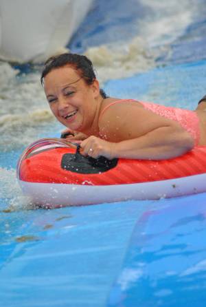 Ilminster Town FC fun day Part 35 – July 9, 2016: A giant water slide was the star attraction at a family fun day held to celebrate Ilminster Town Football Club’s new Archie Gooch Pavilion headquarters in Britten’s Field. Photo 1