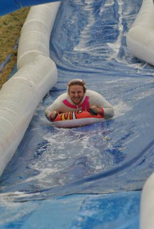 Ilminster Town FC fun day Part 35 – July 9, 2016: A giant water slide was the star attraction at a family fun day held to celebrate Ilminster Town Football Club’s new Archie Gooch Pavilion headquarters in Britten’s Field. Photo 19