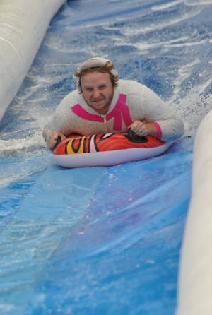 Ilminster Town FC fun day Part 35 – July 9, 2016: A giant water slide was the star attraction at a family fun day held to celebrate Ilminster Town Football Club’s new Archie Gooch Pavilion headquarters in Britten’s Field. Photo 20