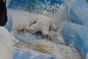 Ilminster Town FC fun day Part 35 – July 9, 2016: A giant water slide was the star attraction at a family fun day held to celebrate Ilminster Town Football Club’s new Archie Gooch Pavilion headquarters in Britten’s Field. Photo 22