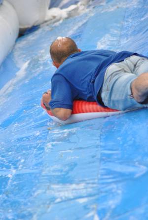 Ilminster Town FC fun day Part 35 – July 9, 2016: A giant water slide was the star attraction at a family fun day held to celebrate Ilminster Town Football Club’s new Archie Gooch Pavilion headquarters in Britten’s Field. Photo 23