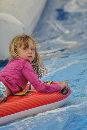Ilminster Town FC fun day Part 35 – July 9, 2016: A giant water slide was the star attraction at a family fun day held to celebrate Ilminster Town Football Club’s new Archie Gooch Pavilion headquarters in Britten’s Field. Photo 27